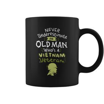 Never Underestimate An Old Whos A Vietnam Veteran Gift Graphic Design Printed Casual Daily Basic Coffee Mug | Favorety