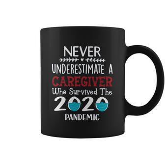 Never Underestimate Who Survived The Pandemic Caregiver Coffee Mug | Favorety DE