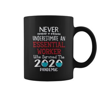 Never Underestimate Who Survived The Pandemic Essential Worker Coffee Mug | Favorety CA