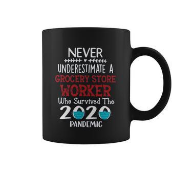 Never Underestimate Who Survived The Pandemic Grocery Store Worker Coffee Mug | Favorety CA