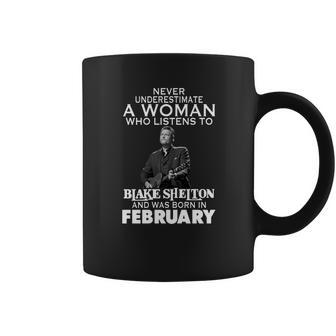 Never Underestimate A Woman Who Listens To Blake Shelton And Was Born In February Shirt Hoodie Sweater Longsleeve T-Shirt Coffee Mug | Favorety