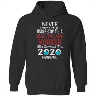 Never Underestimate Who Survived The Pandemic Healthcare Worker Hoodie | Favorety