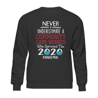 Never Underestimate Who Survived The Pandemic Community Care Worker Sweatshirt | Favorety UK