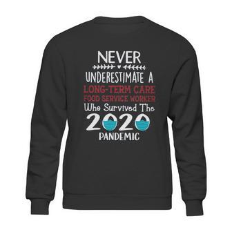 Never Underestimate Who Survived The Pandemic Long Term Care Food Service Worker Sweatshirt | Favorety CA