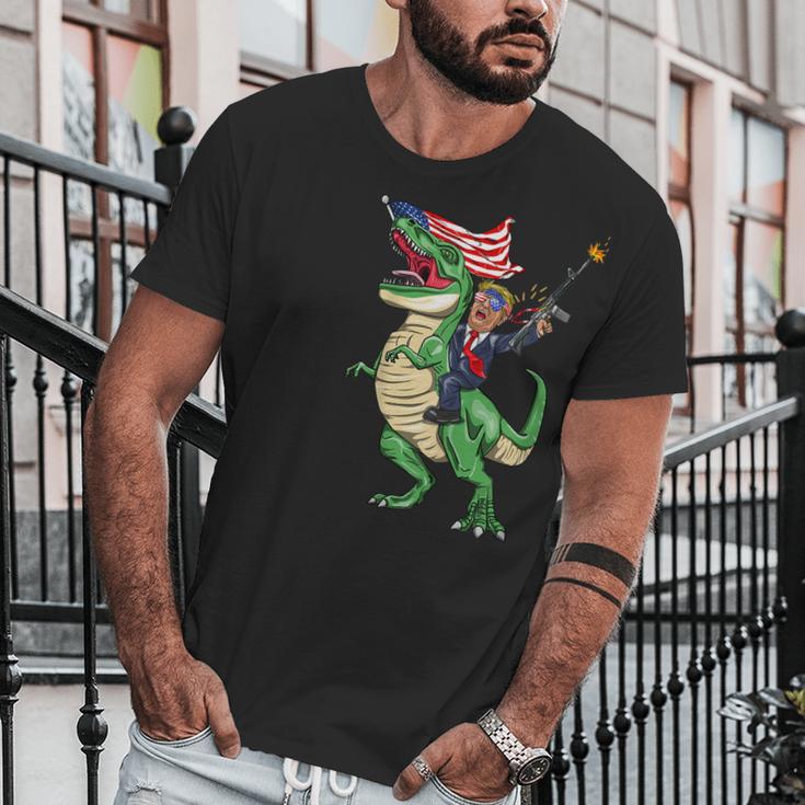 Machine Gun Trump On Rex Dinosaur With American Flag Graphic Design Printed Casual Daily Basic Men T-Shirt