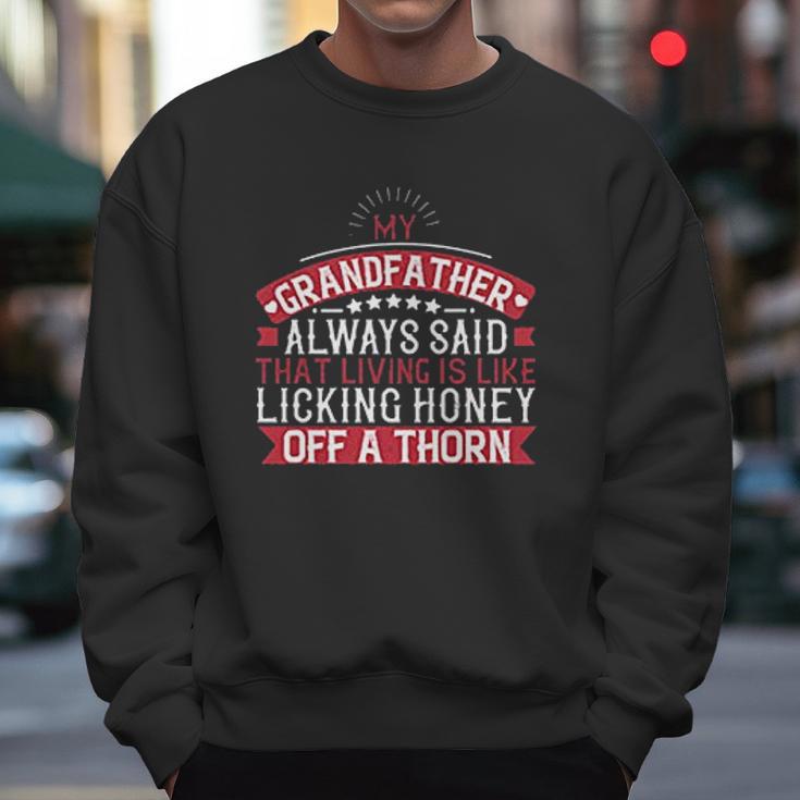 My Grandfather Always Said That Living Is Like Licking Honey Off A Thorn Men Sweatshirt