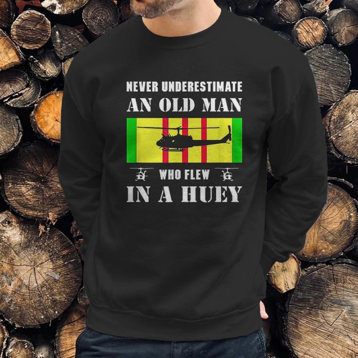 Never Underestimate Old Man Who Flew In Huey Vietnam Veteran Men Sweatshirt