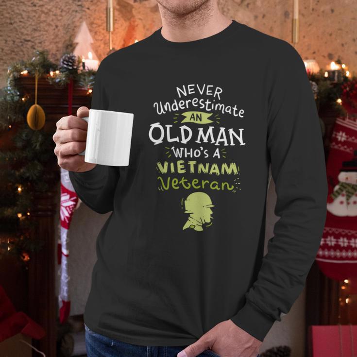 Never Underestimate An Old Whos A Vietnam Veteran Gift Graphic Design Printed Casual Daily Basic Men Long Sleeve Tshirt