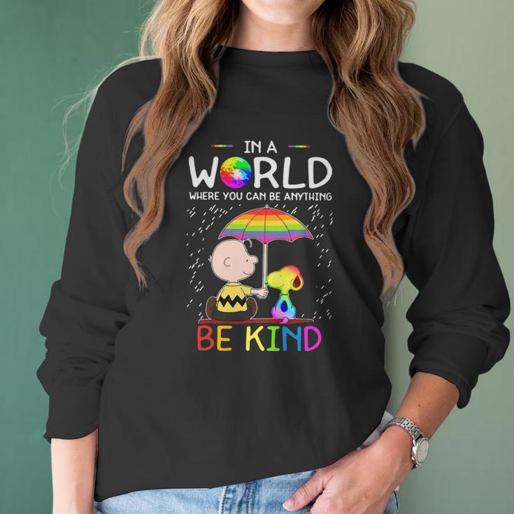 In A World Where You Can Be Anything Be Kind Lgbt Pride Snoopy Shirt Women Long Sleeve Tshirt