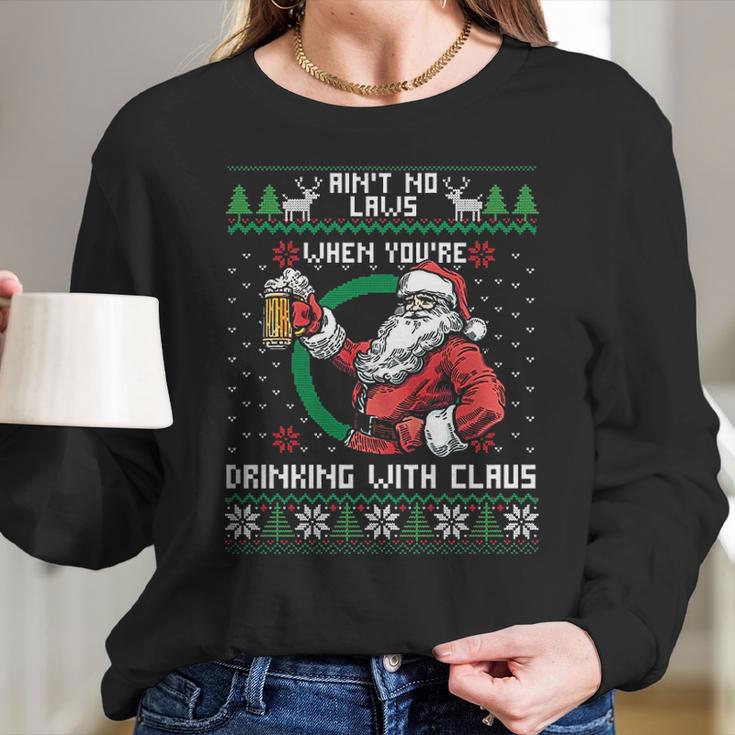 Aint No Laws When You Are Drinking With Claus Funny Christmas Women Long Sleeve Tshirt