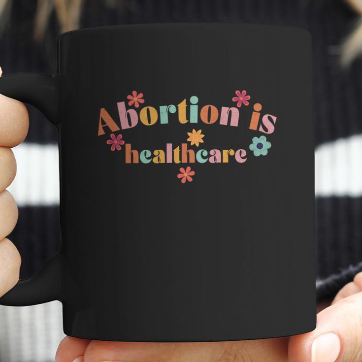 Abortion Is Healthcare Coffee Mug