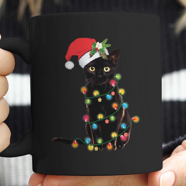 Black Santa Cat Tangled Up In Lights Christmas Santa Coffee Mug