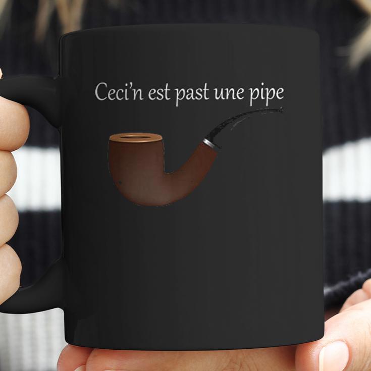 Ceci Nest Pas Une Pipe Coffee Mug