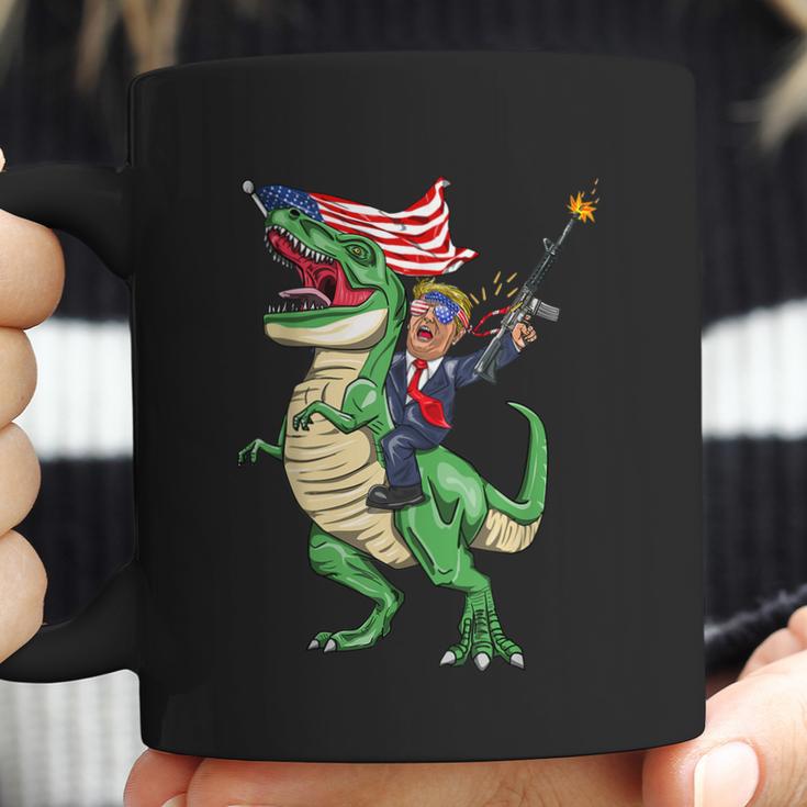 Machine Gun Trump On Rex Dinosaur With American Flag Graphic Design Printed Casual Daily Basic Coffee Mug