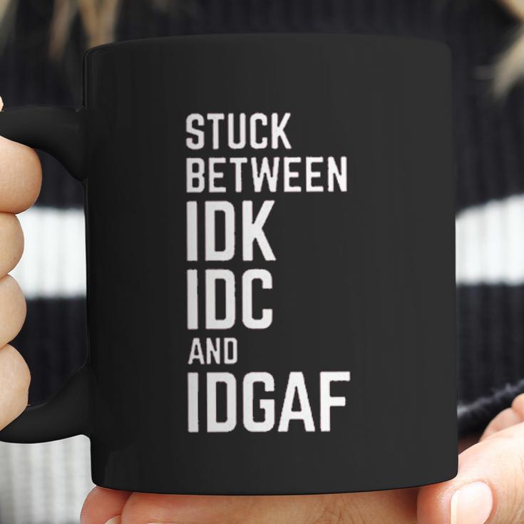 Stuck Between Idk Idc And Idgaf Coffee Mug