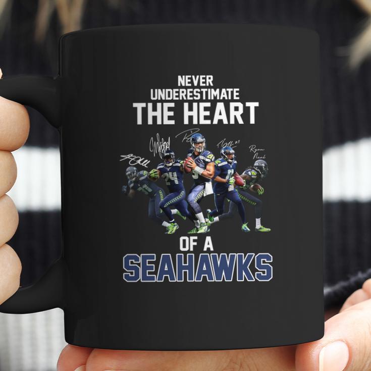 Never Underestimate The Heart Of A Seattle Seahawk Signatures Shirt Coffee Mug