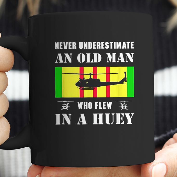 Never Underestimate Old Man Who Flew In Huey Vietnam Veteran Coffee Mug