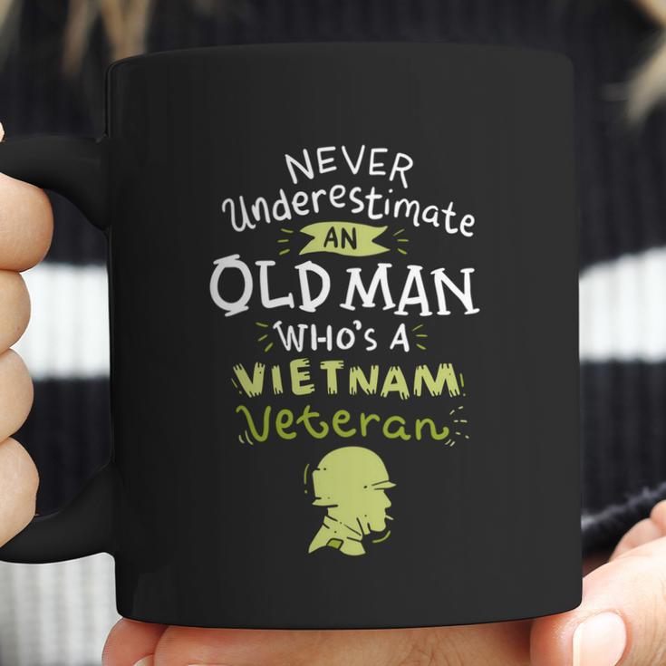 Never Underestimate An Old Whos A Vietnam Veteran Gift Graphic Design Printed Casual Daily Basic Coffee Mug