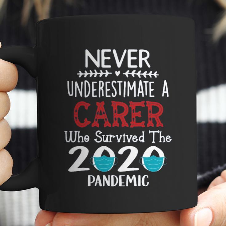 Never Underestimate Who Survived The Pandemic Carer Coffee Mug