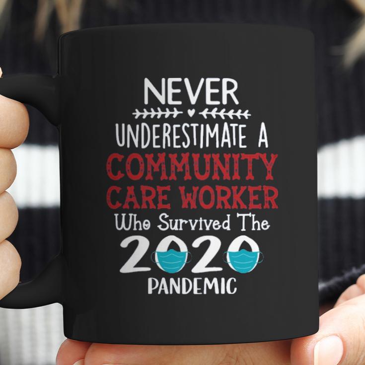 Never Underestimate Who Survived The Pandemic Community Care Worker Coffee Mug