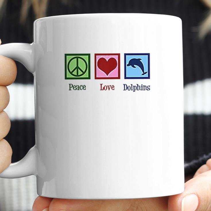 Peace Love Dolphins Coffee Mug