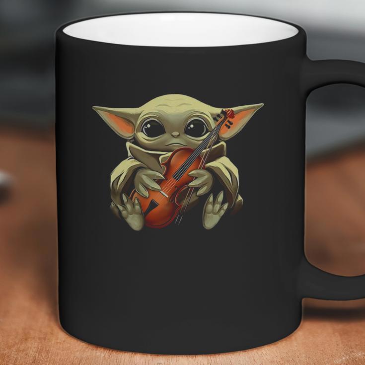 Baby Yoda Hugging Violin Coffee Mug