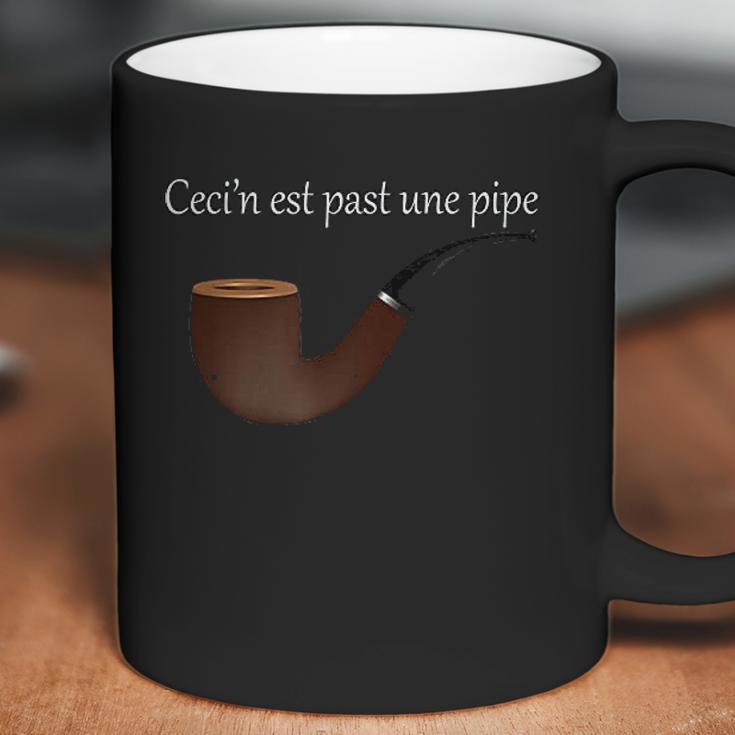 Ceci Nest Pas Une Pipe Coffee Mug