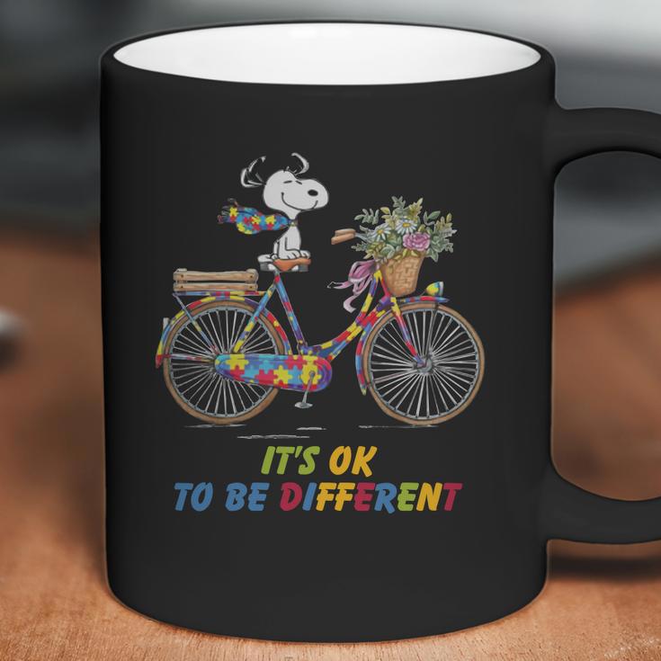 Snoopy Riding Bike It’S Ok To Be Different Autism Shirt Coffee Mug