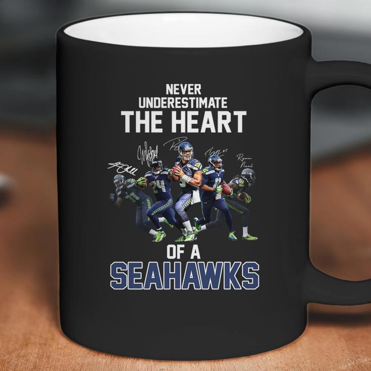 Never Underestimate The Heart Of A Seattle Seahawk Signatures Shirt Coffee Mug