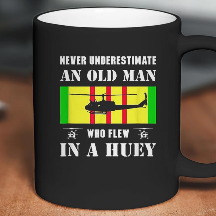 Never Underestimate Old Man Who Flew In Huey Vietnam Veteran Coffee Mug