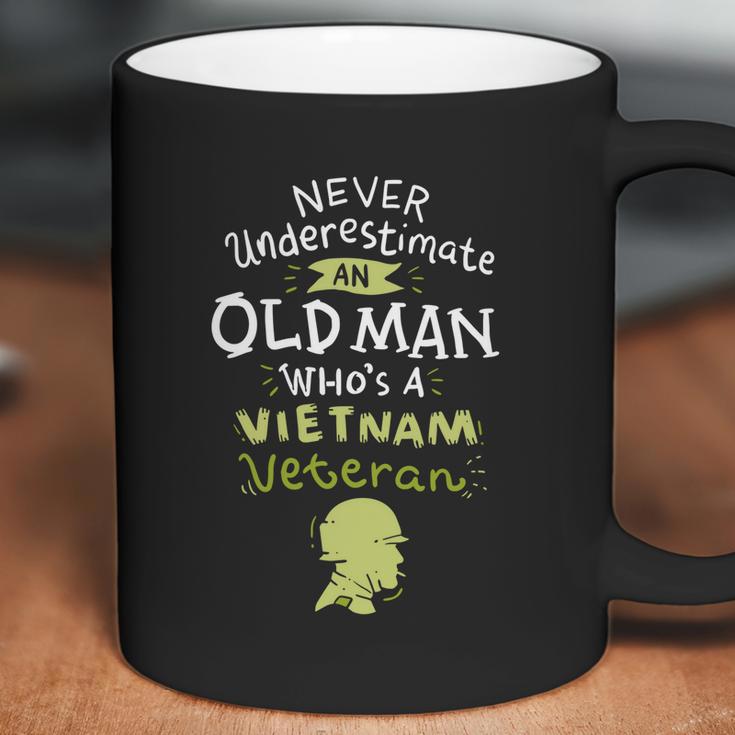 Never Underestimate An Old Whos A Vietnam Veteran Gift Graphic Design Printed Casual Daily Basic Coffee Mug