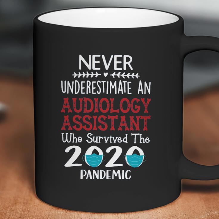 Never Underestimate Who Survived The Pandemic Audiology Assistant Coffee Mug