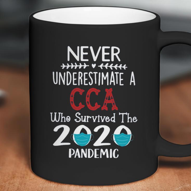 Never Underestimate Who Survived The Pandemic Cca Coffee Mug