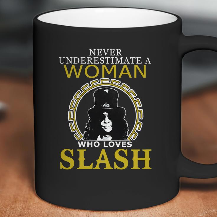 Never Underestimate A Woman Love Slash Coffee Mug