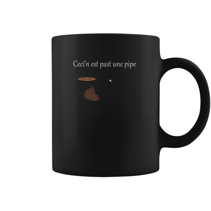 Ceci Nest Pas Une Pipe Coffee Mug