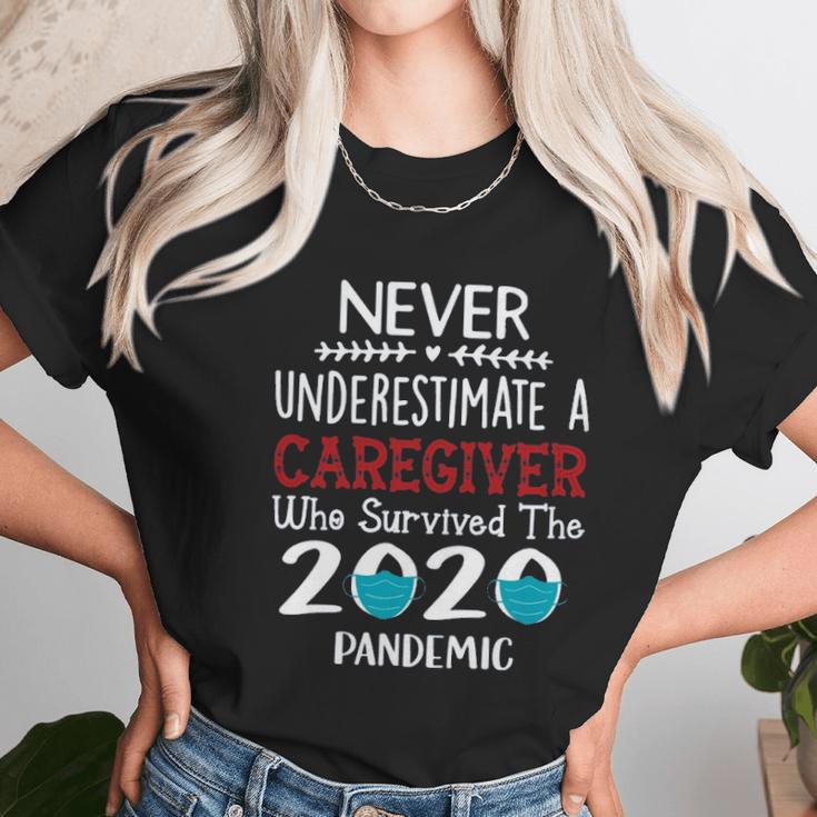 Never Underestimate Who Survived The Pandemic Caregiver Unisex T-Shirt Gifts for Her