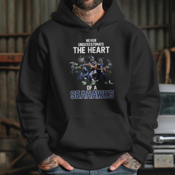 Never Underestimate The Heart Of A Seattle Seahawk Signatures Shirt Hoodie Gifts for Her