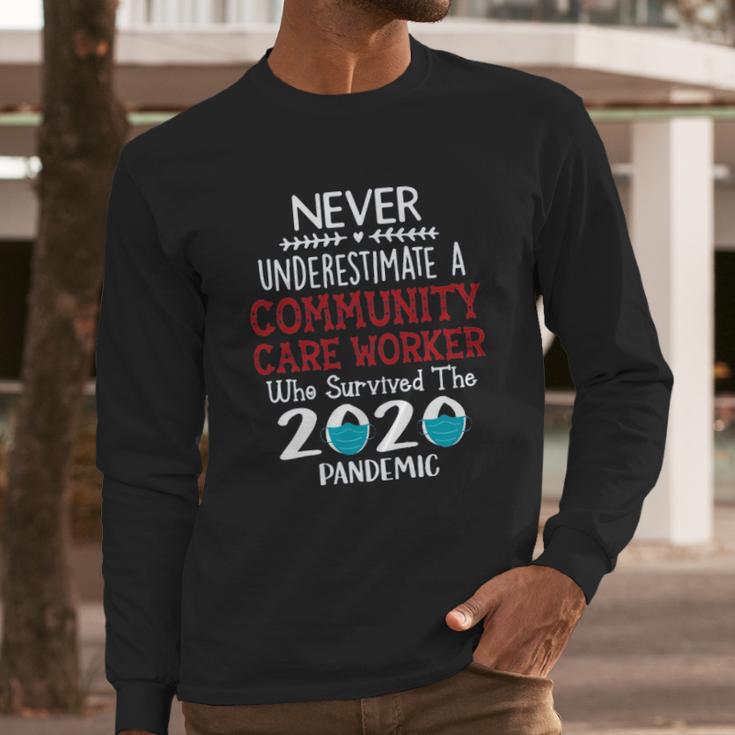 Never Underestimate Who Survived The Pandemic Community Care Worker Long Sleeve T-Shirt Gifts for Him