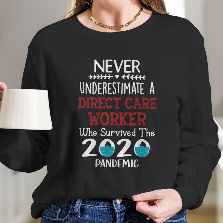 Never Underestimate Who Survived The Pandemic Direct Care Worker Long Sleeve T-Shirt Gifts for Her