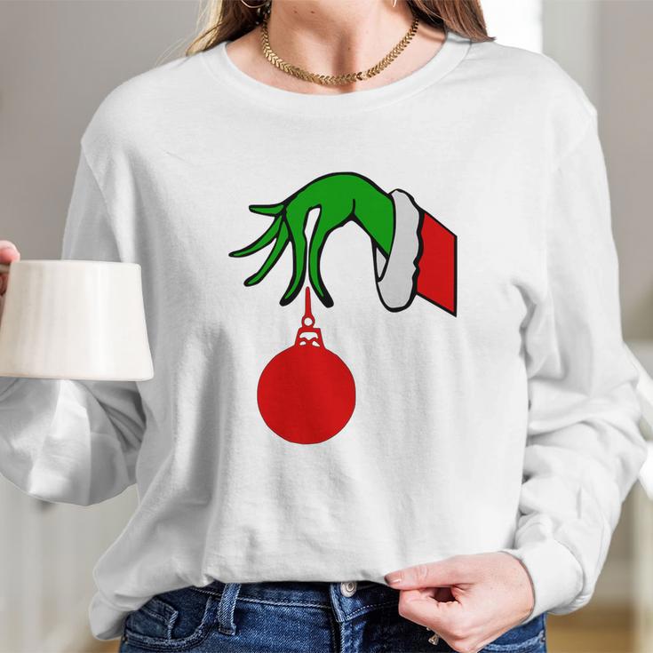 Grinch Arm Holding Ornament T-Shirt Long Sleeve T-Shirt Gifts for Her