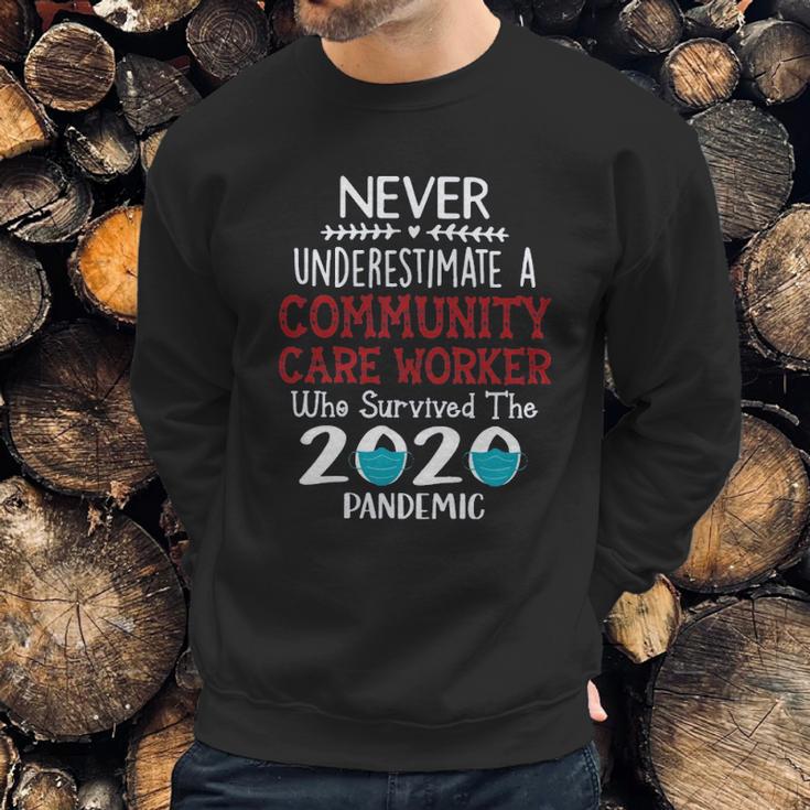 Never Underestimate Who Survived The Pandemic Community Care Worker Sweatshirt Gifts for Him