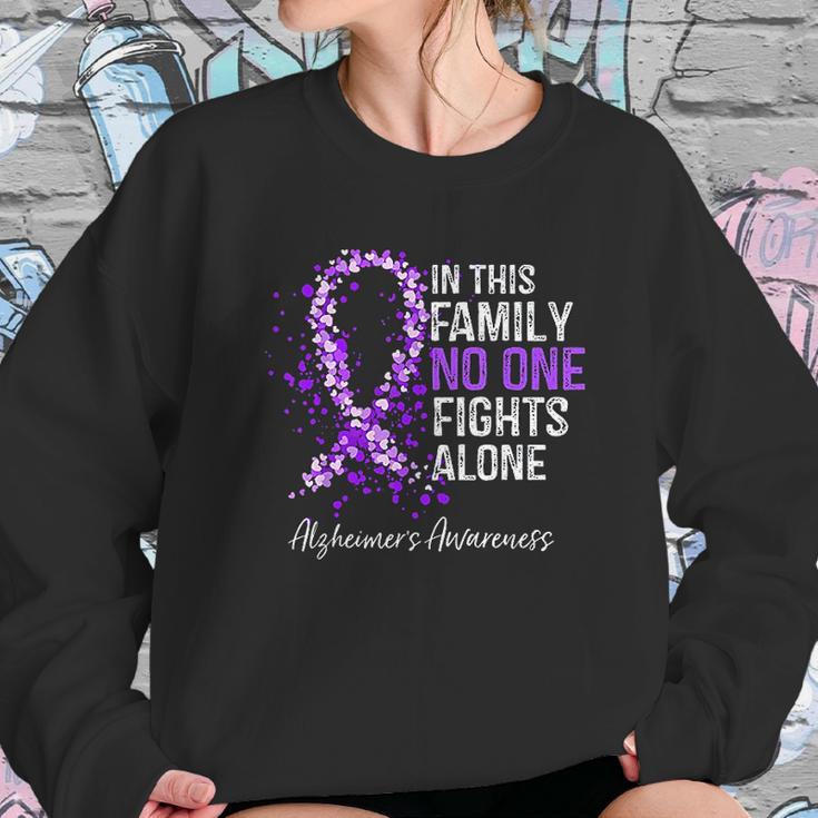 In This Family No One Fights Alone Alzheimer Ribbon Sweatshirt Gifts for Her