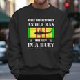 Never Underestimate Old Man Who Flew In Huey Vietnam Veteran Men Sweatshirt