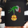 Be Kind Grinch Hand Holding Coffee Mug