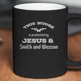 This House Is Protected By Jesus & Smith And Wesson Coffee Mug