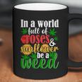 I N A W O R L D F U L L O F R O S E S A N D S U N F L O W E R B E A W E E D Coffee Mug