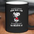 Snoopy My Body Knows How Old I Am But My Mind Refuses To Believe It Shirt Coffee Mug