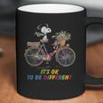 Snoopy Riding Bike It’S Ok To Be Different Autism Shirt Coffee Mug