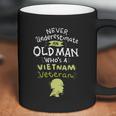 Never Underestimate An Old Whos A Vietnam Veteran Gift Graphic Design Printed Casual Daily Basic Coffee Mug