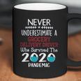 Never Underestimate Who Survived The Pandemic Grocery Delivery Driver Coffee Mug